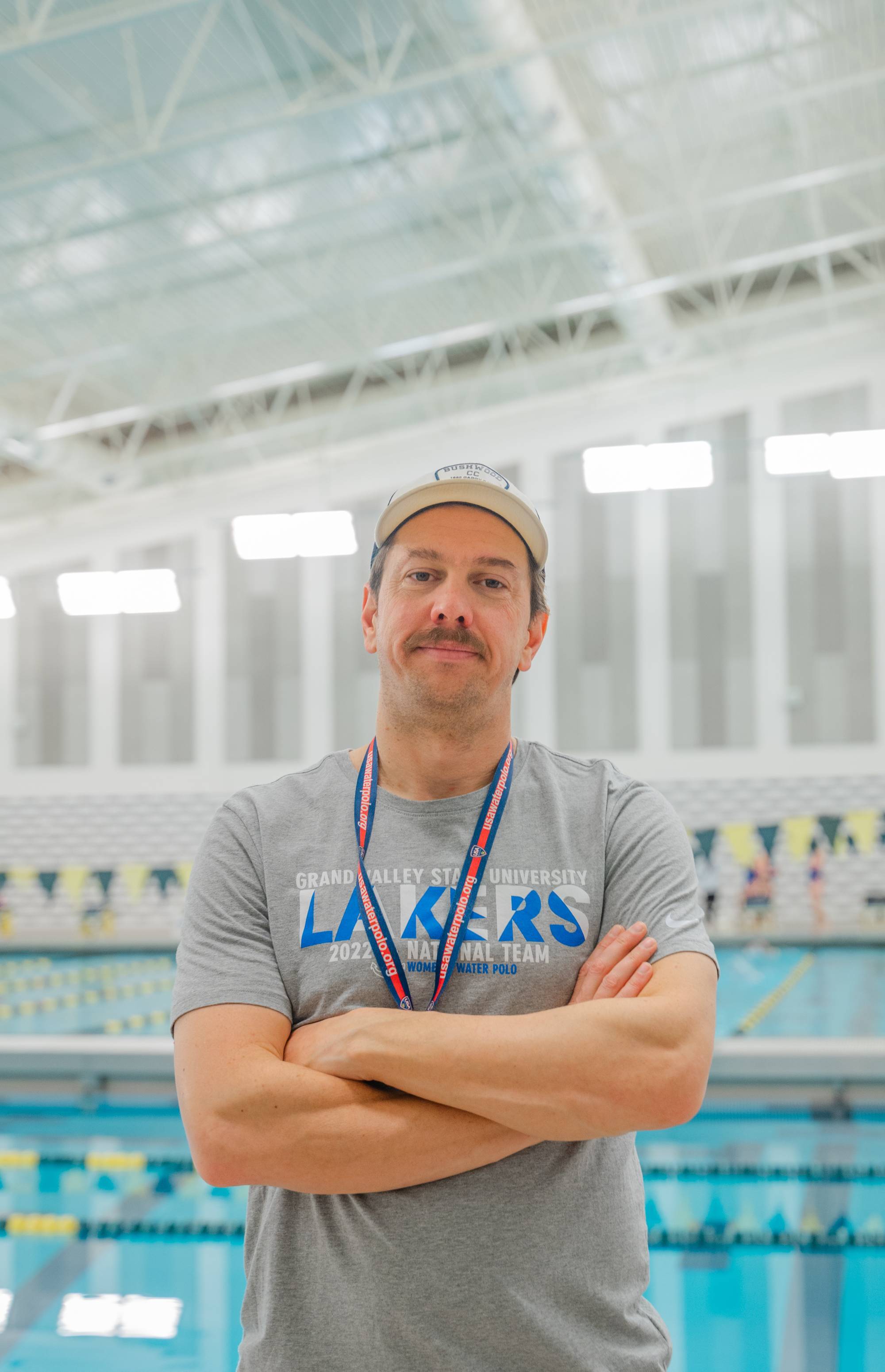Coach Josh looking at camera and smiling